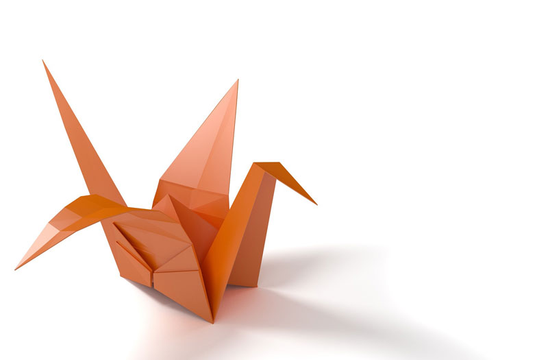 An orange origami paper crane