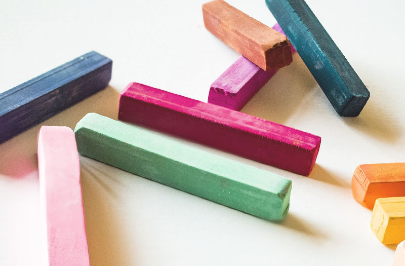 Sticks of coloured chalk pastels