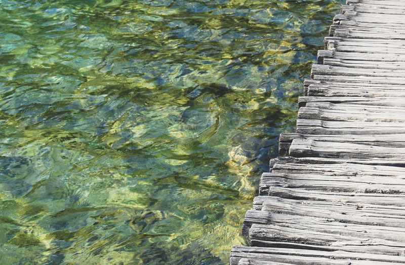 Wooden bridge over river